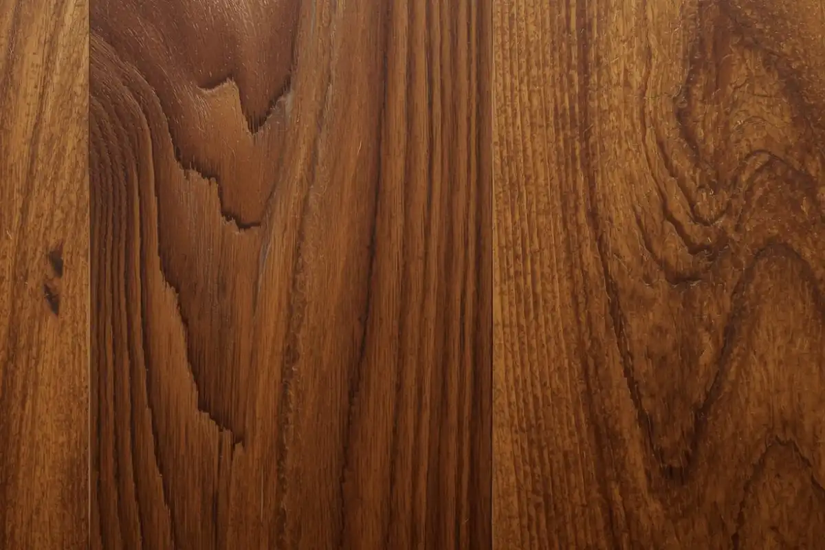 Applying a natural oil finish to sheesham wood by hand